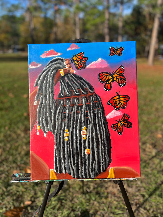 black art woman with locs